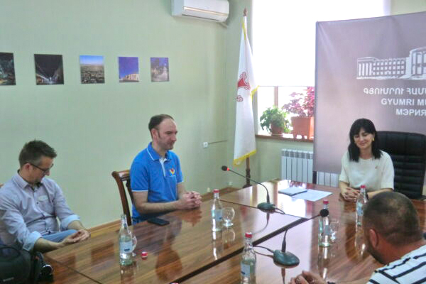 From left, Thorsten Weiss, Maik Gruchenberg and Deputy Mayor Lusine Sanoyan