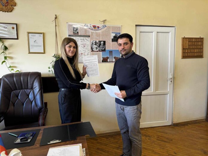 Karine Smbatyan, Director of Sardarapat Middle School, and Karen Gharslyan